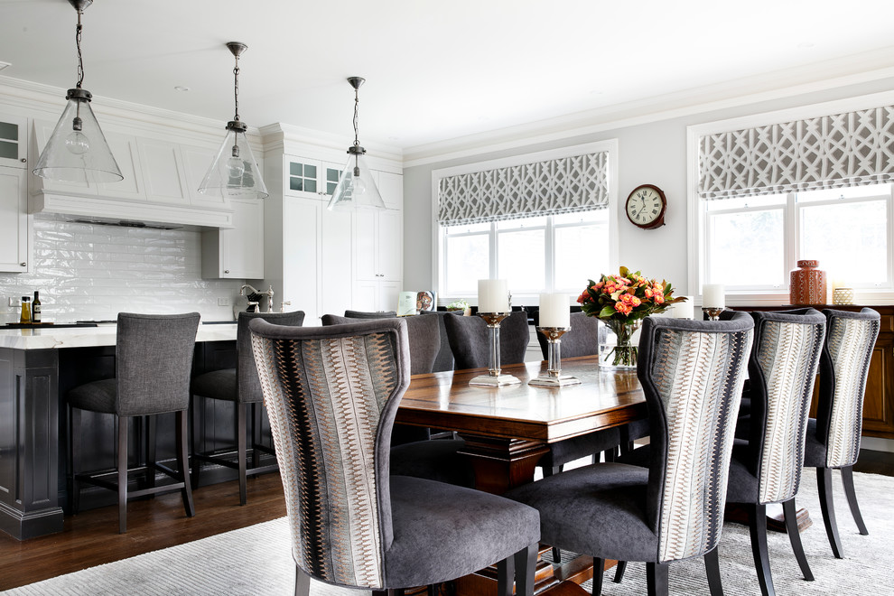 Photo of a traditional dining room in Sydney with grey walls and medium hardwood floors.