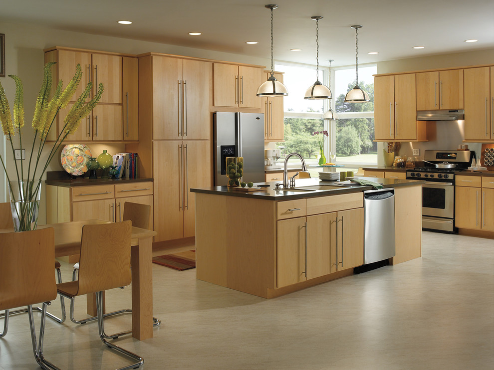 Inspiration for a transitional kitchen remodel in Indianapolis with light wood cabinets and stainless steel appliances