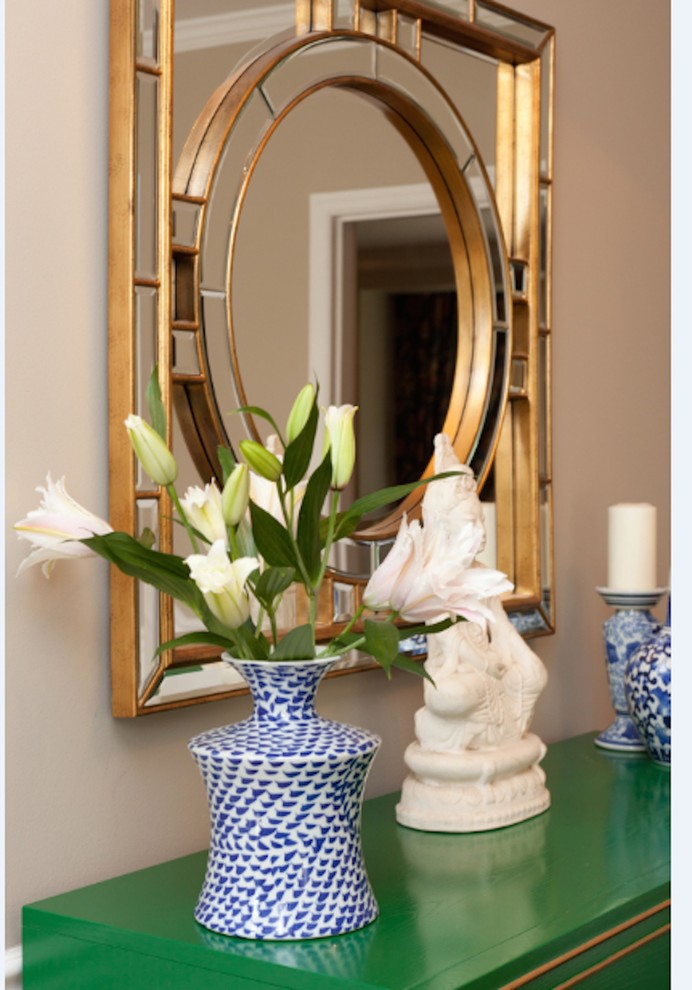 Inspiration for a mid-sized transitional light wood floor foyer remodel in Miami with beige walls and a red front door