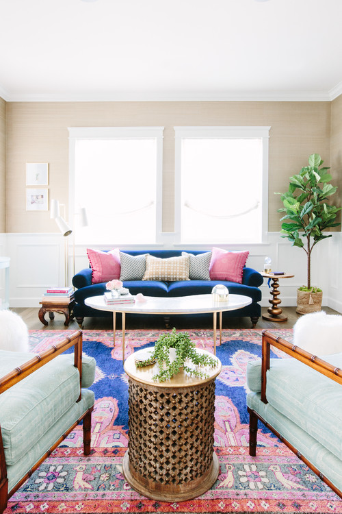 Weekend Design Glam Living Room Packed With Personality Mynewsla Kismet Rug In Navy Caitlin Wilson Chairs Previously Owned By Client And Reupolstered Chunari Sage Blue Raoul Textiles Console Tables Under Windows