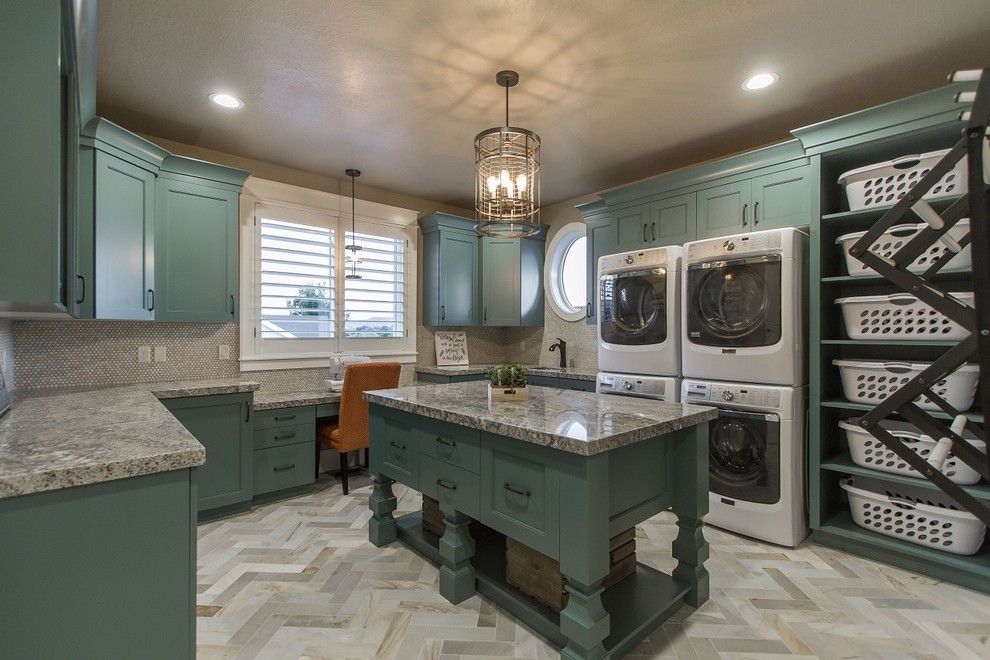 Inspiration for a large country u-shaped utility room in Salt Lake City with a single-bowl sink, shaker cabinets, granite benchtops, grey walls, ceramic floors and a stacked washer and dryer.