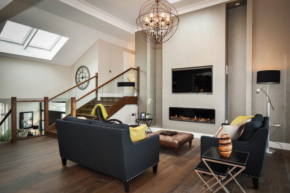 Photo of a mid-sized transitional loft-style living room in Other with grey walls, dark hardwood floors and a ribbon fireplace.