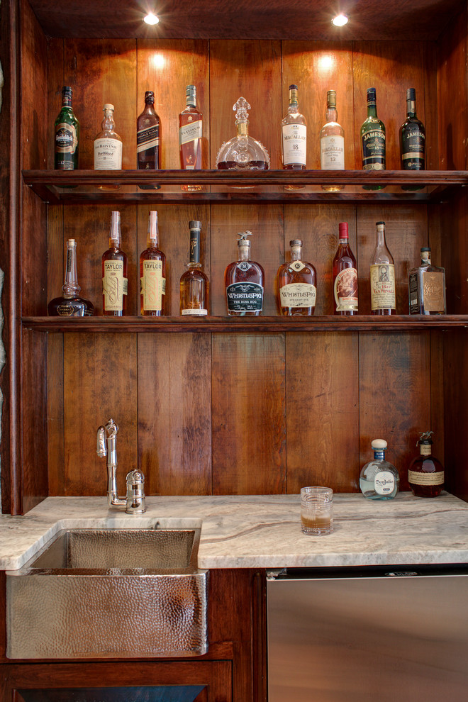 Photo of a traditional wet bar in Boston with an undermount sink, open cabinets, medium wood cabinets and marble benchtops.