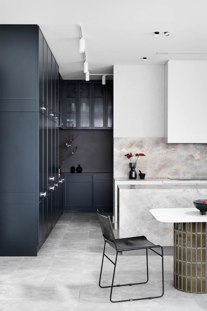Design ideas for a large contemporary galley open plan kitchen in Melbourne with a single-bowl sink, multi-coloured splashback, stainless steel appliances, with island, grey floor and multi-coloured benchtop.