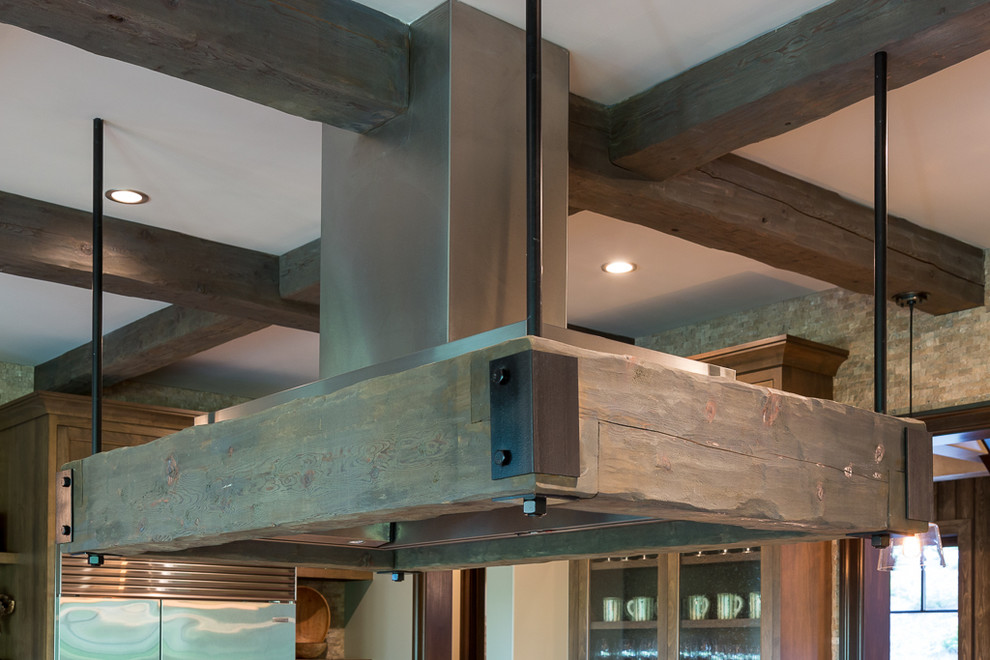 Large mountain style open concept kitchen photo