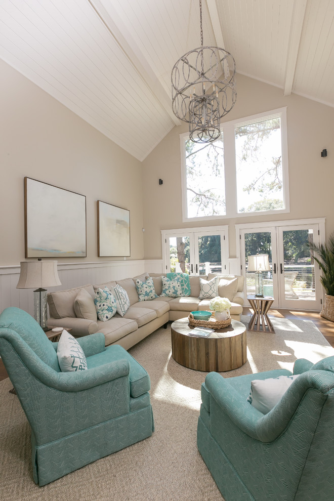 Design ideas for a beach style family room in Charleston.