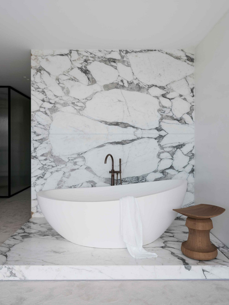 Photo of a contemporary bathroom in Sydney with a freestanding tub.