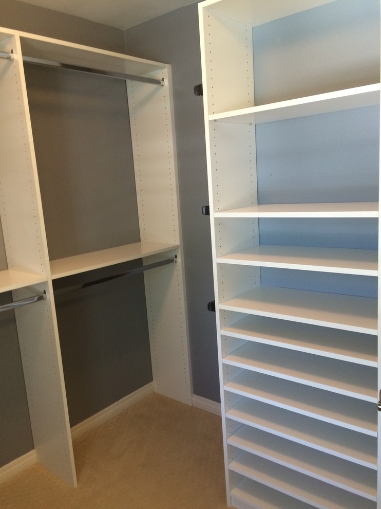 This is an example of a transitional storage and wardrobe in San Diego.