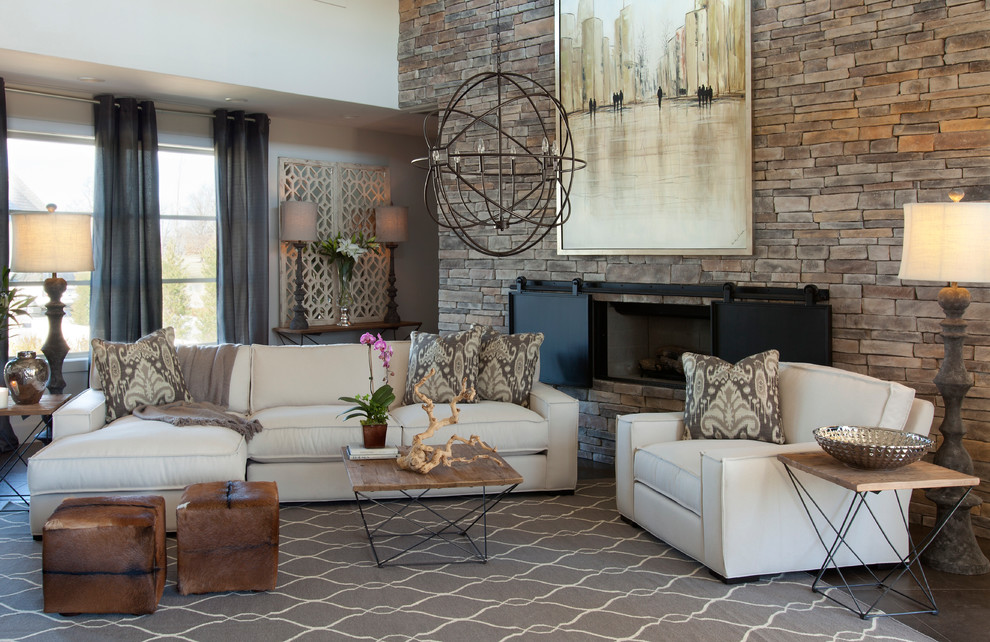 Design ideas for a transitional living room in Other with a stone fireplace surround.