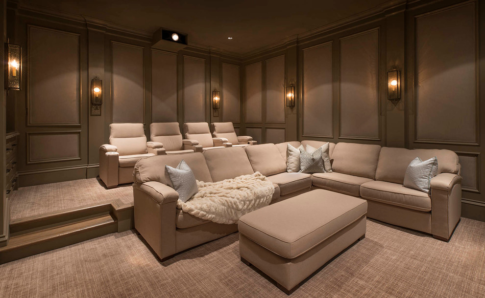 Inspiration for a large mediterranean enclosed home theatre in Dallas with beige walls, carpet and a projector screen.