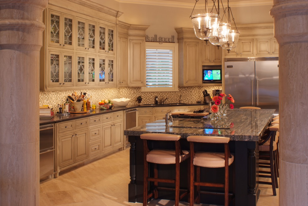 Kitchen - transitional kitchen idea in Houston with recessed-panel cabinets and distressed cabinets