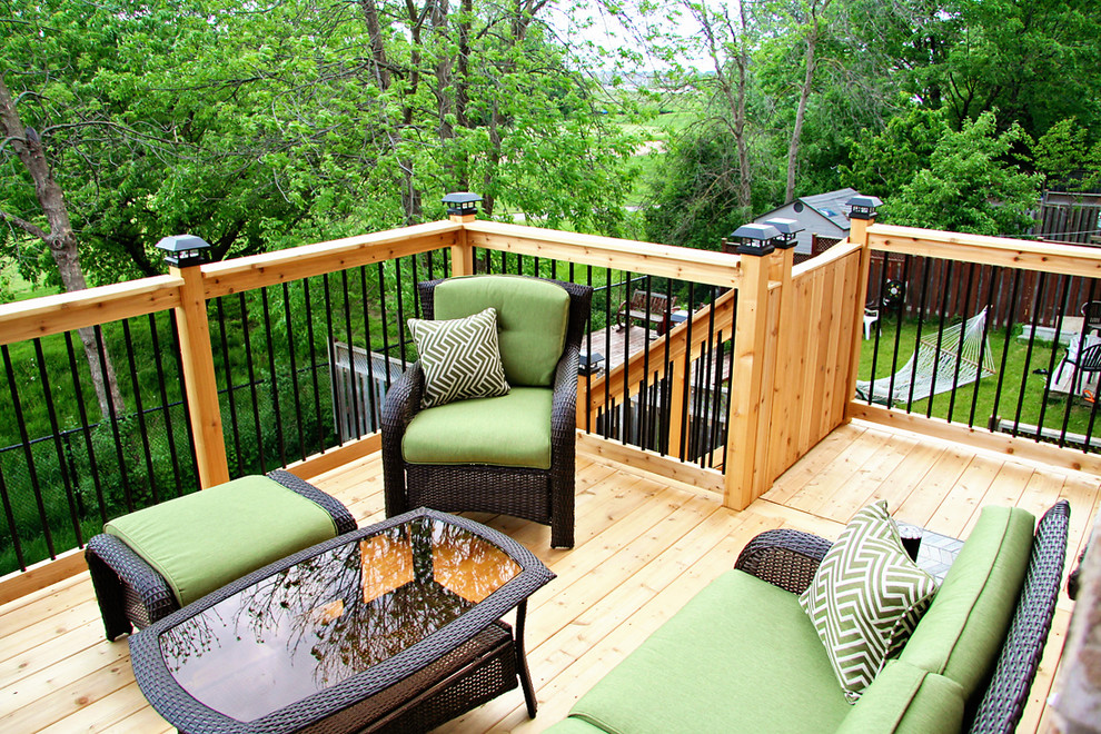 Small trendy backyard deck photo in Toronto with no cover