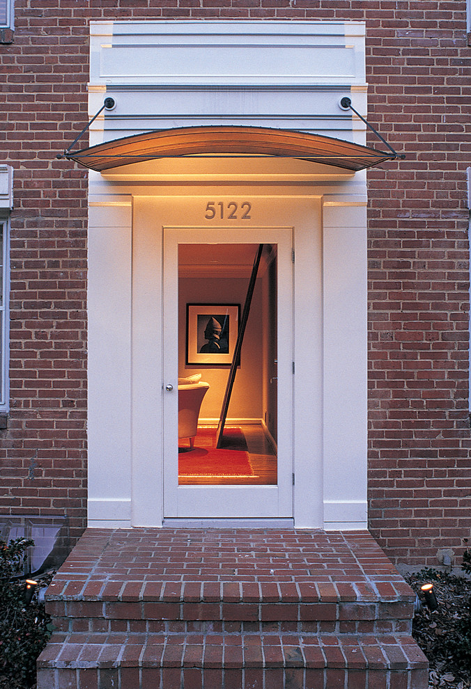 Photo of a contemporary front door in DC Metro with a single front door and a glass front door.