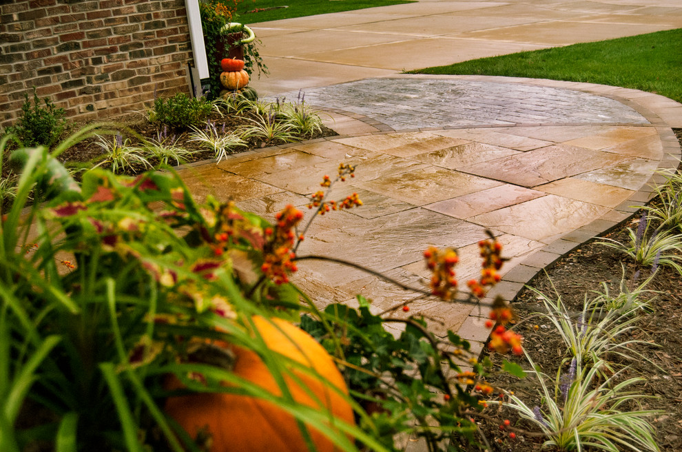 Photo of a transitional front yard stone garden path in St Louis for fall.