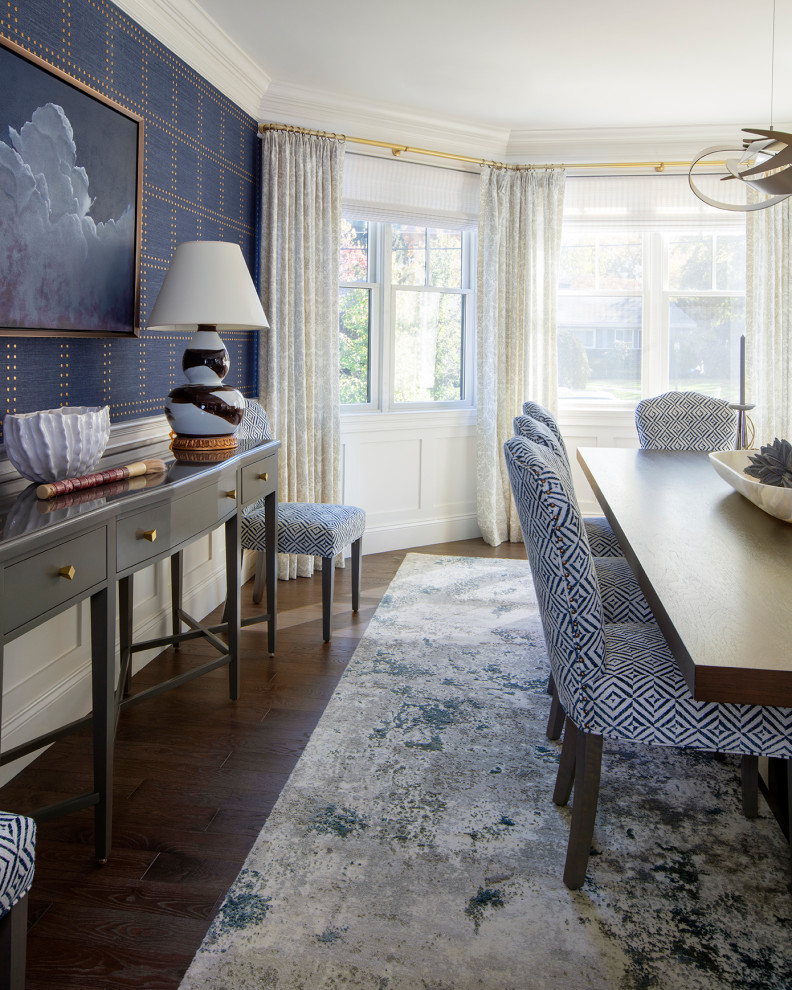 This is an example of a large transitional separate dining room in Boston with blue walls and no fireplace.
