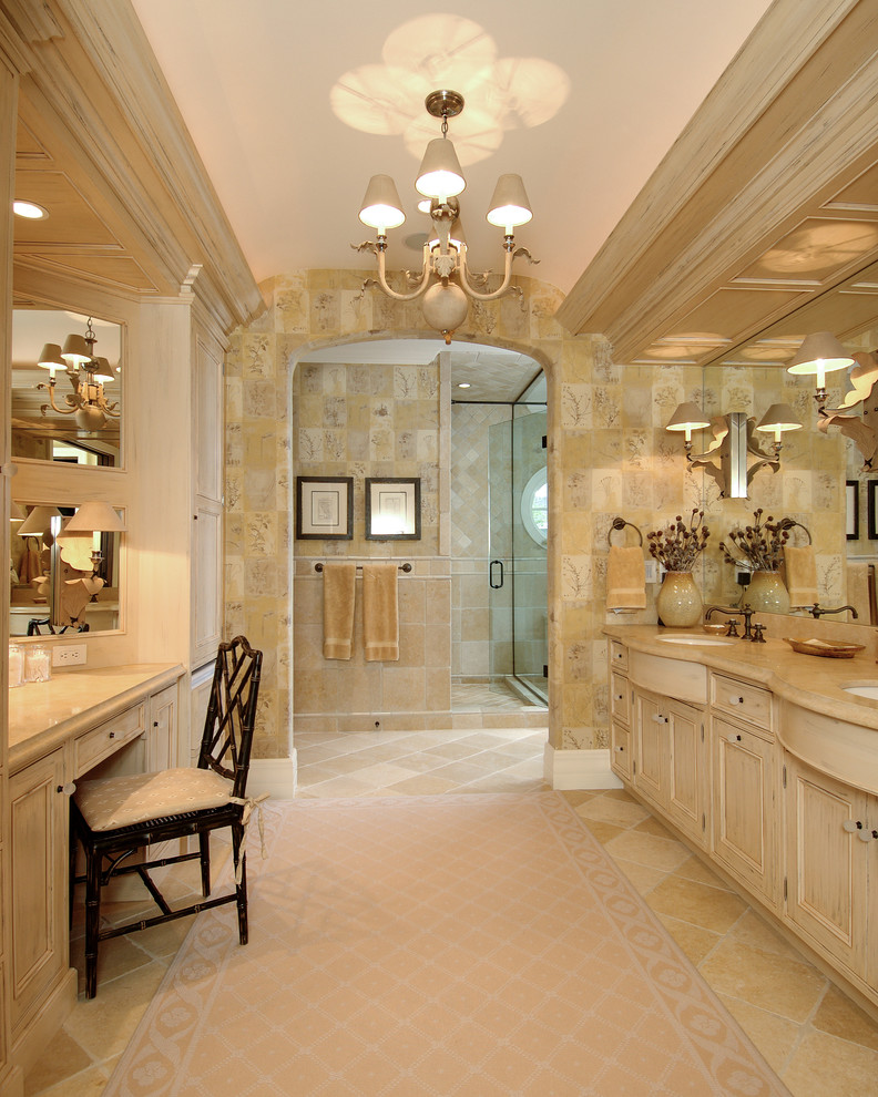 Inspiration for a beach style master bathroom in Miami with recessed-panel cabinets and beige cabinets.
