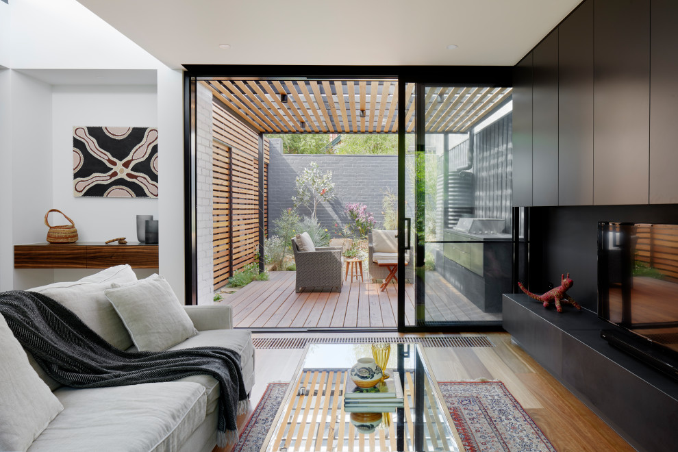 Inspiration for a mid-sized modern living room in Melbourne.