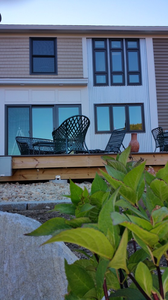 Deck - mid-sized transitional backyard deck idea in Boston