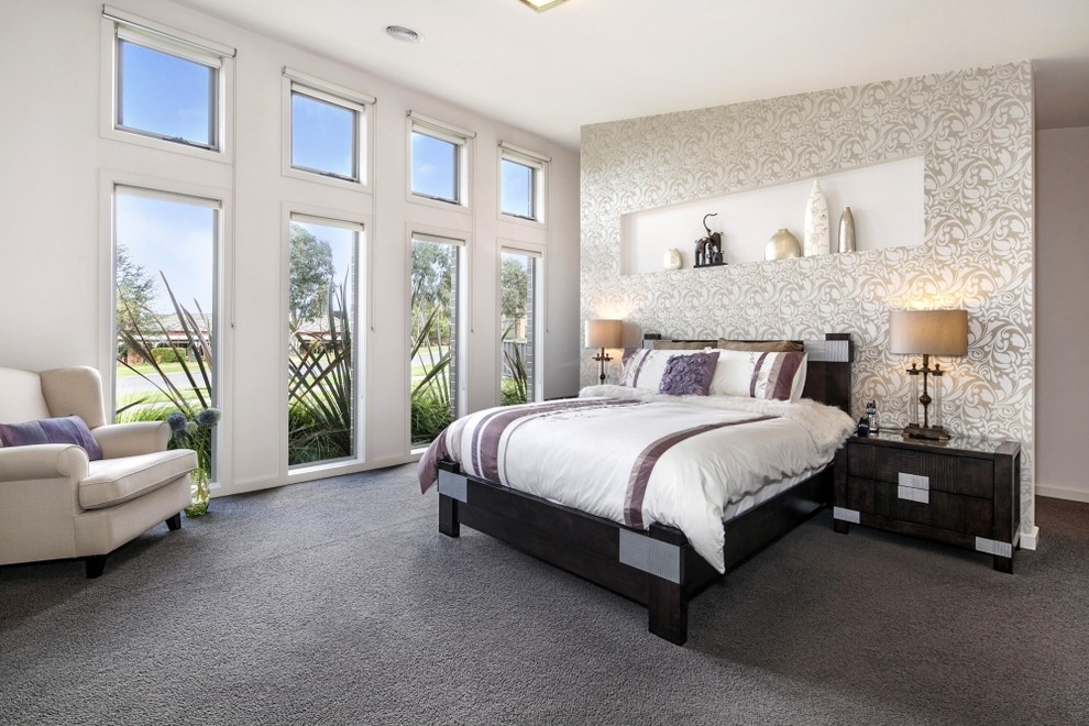 This is an example of a mid-sized transitional master bedroom in Other with white walls, carpet and grey floor.