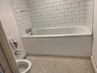 Bathroom in flat above office