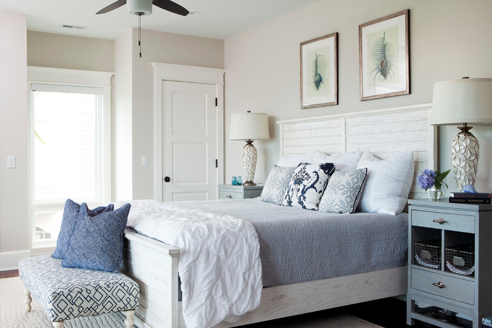 Example of a beach style bedroom design in Wilmington with beige walls