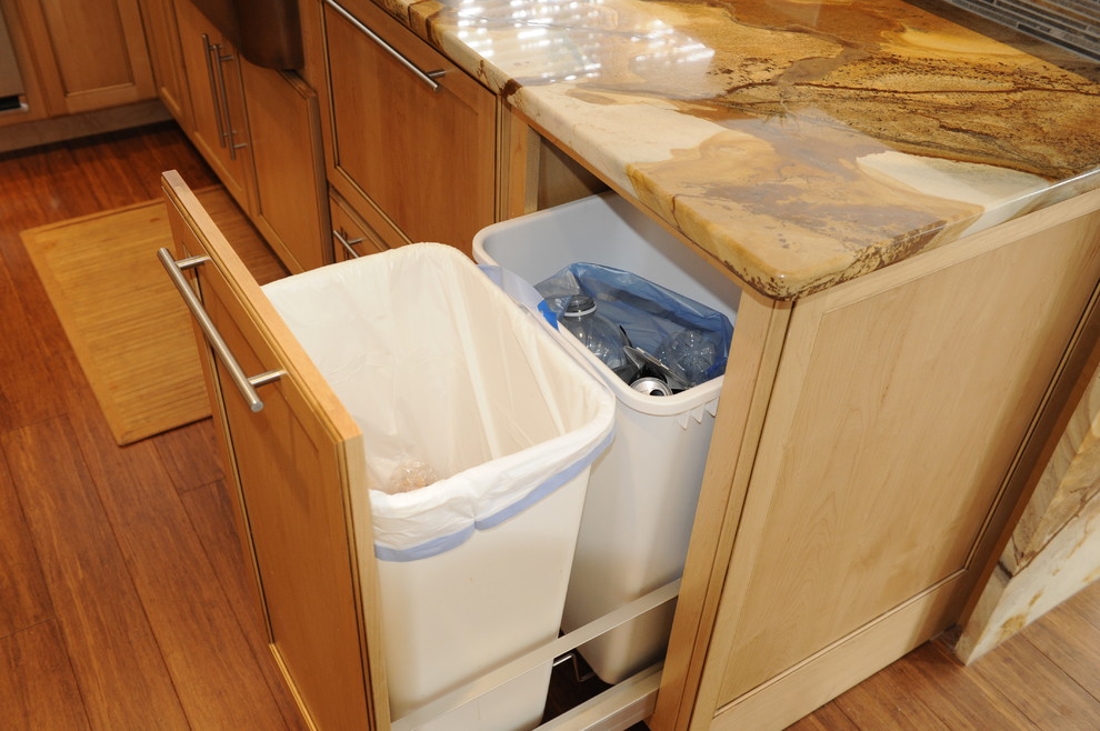 Eat-in kitchen - mid-sized transitional u-shaped light wood floor eat-in kitchen idea in Baltimore with a farmhouse sink, beaded inset cabinets, light wood cabinets, onyx countertops, stainless steel appliances and an island