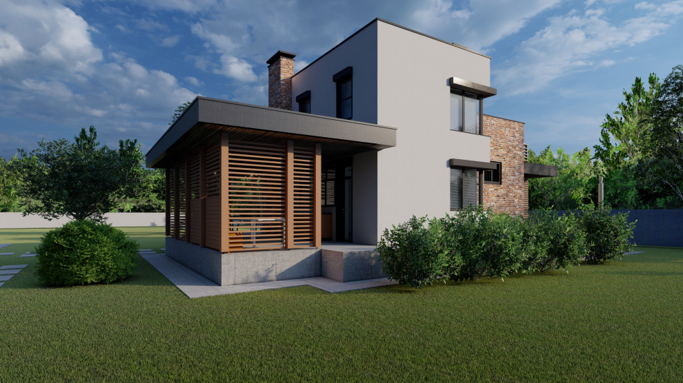 Боковой фасад. Слева закрытая терраса с печью-барбекю, справа открытая терраса с