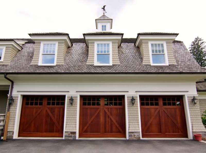 Expansive traditional attached three-car garage in New York.