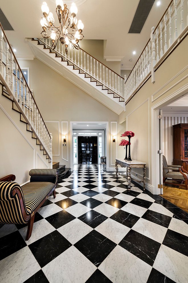 Design ideas for a traditional foyer in Perth with multi-coloured floor.