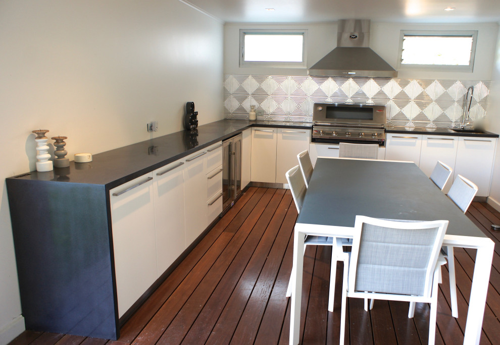 Outdoor Kitchen polished concrete bench tops & reclaimed timber doors Exterior Adelaide