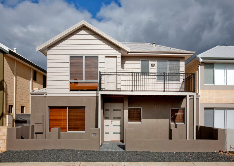 Design ideas for a small contemporary two-storey beige exterior in Perth with mixed siding.