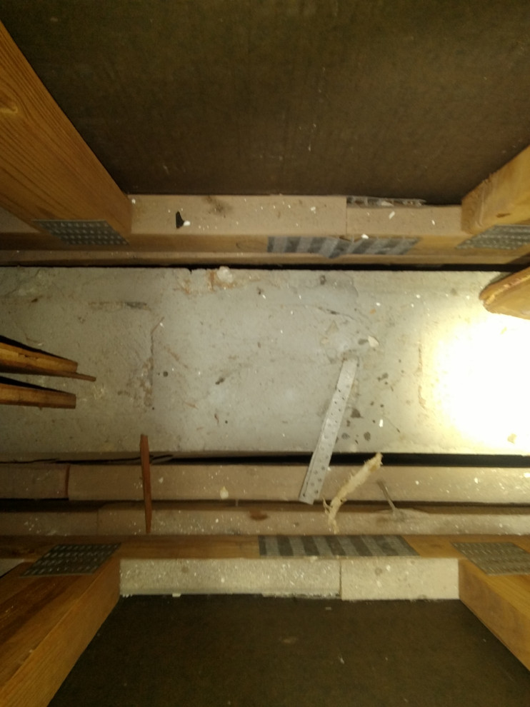 How to seal between concrete firewall and wood framing?