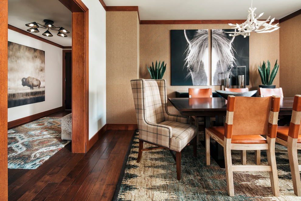 Transitional dining room in Denver with beige walls and dark hardwood floors.