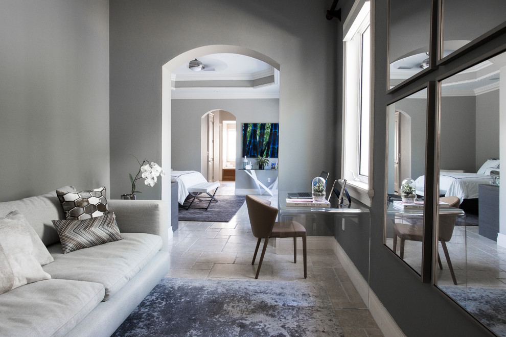 Inspiration for a large contemporary master bedroom in Miami with grey walls, travertine floors and beige floor.