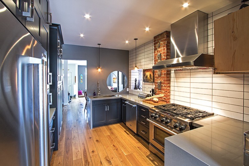 Example of a transitional kitchen design in Toronto