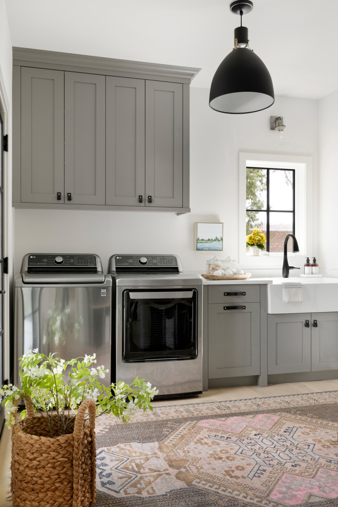 Example of a transitional laundry room design in Minneapolis