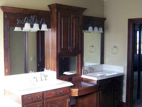 Photo of a small country 3/4 bathroom in Other with furniture-like cabinets, blue cabinets, yellow walls, limestone floors, an undermount sink, granite benchtops and beige floor.