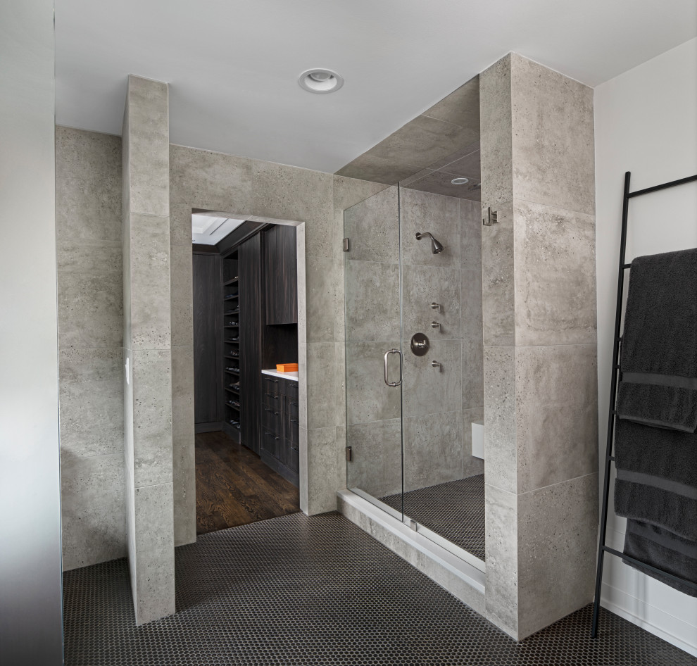 This is an example of a large modern master bathroom in Detroit with flat-panel cabinets, brown cabinets, an alcove shower, a one-piece toilet, beige tile, porcelain tile, beige walls, mosaic tile floors, an undermount sink, engineered quartz benchtops, brown floor, a hinged shower door and beige benchtops.