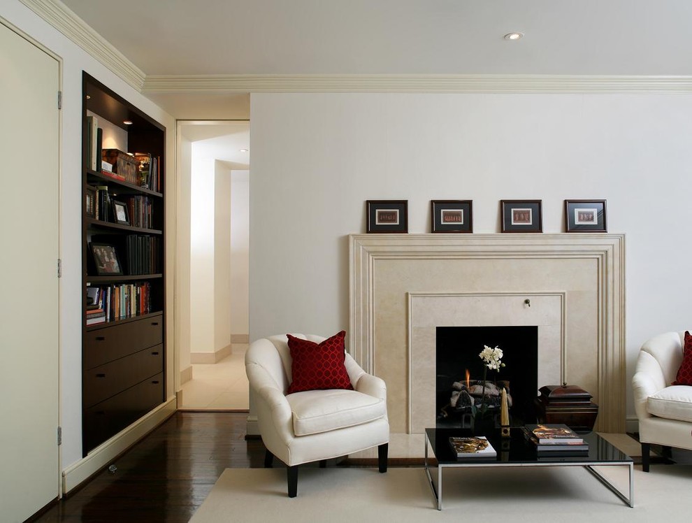 Transitional living room in DC Metro with a stone fireplace surround.