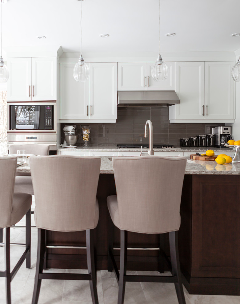 Example of a transitional kitchen design in Toronto