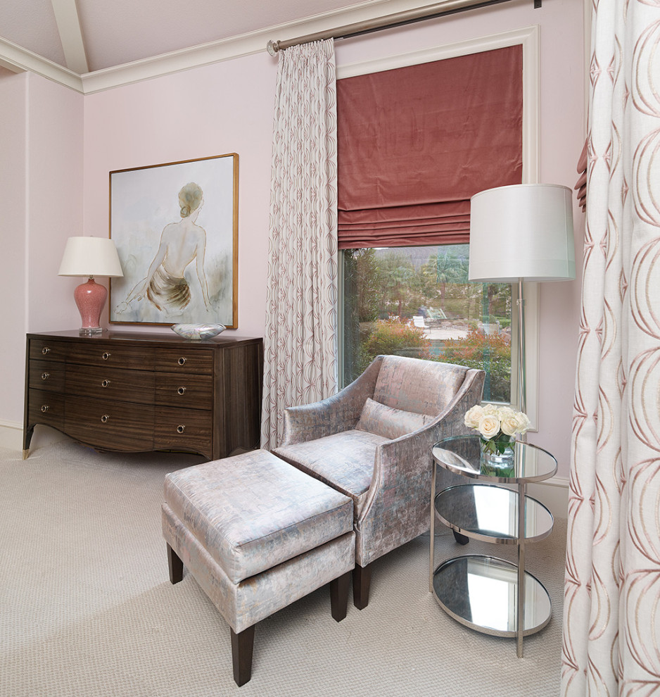 Photo of a mediterranean guest bedroom in Dallas with pink walls, carpet, no fireplace and beige floor.