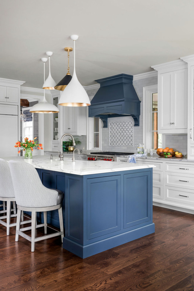 Inspiration for a large l-shaped eat-in kitchen in Atlanta with a farmhouse sink, white cabinets, quartz benchtops, grey splashback, with island, brown floor, white benchtop, marble splashback, shaker cabinets, stainless steel appliances and dark hardwood floors.