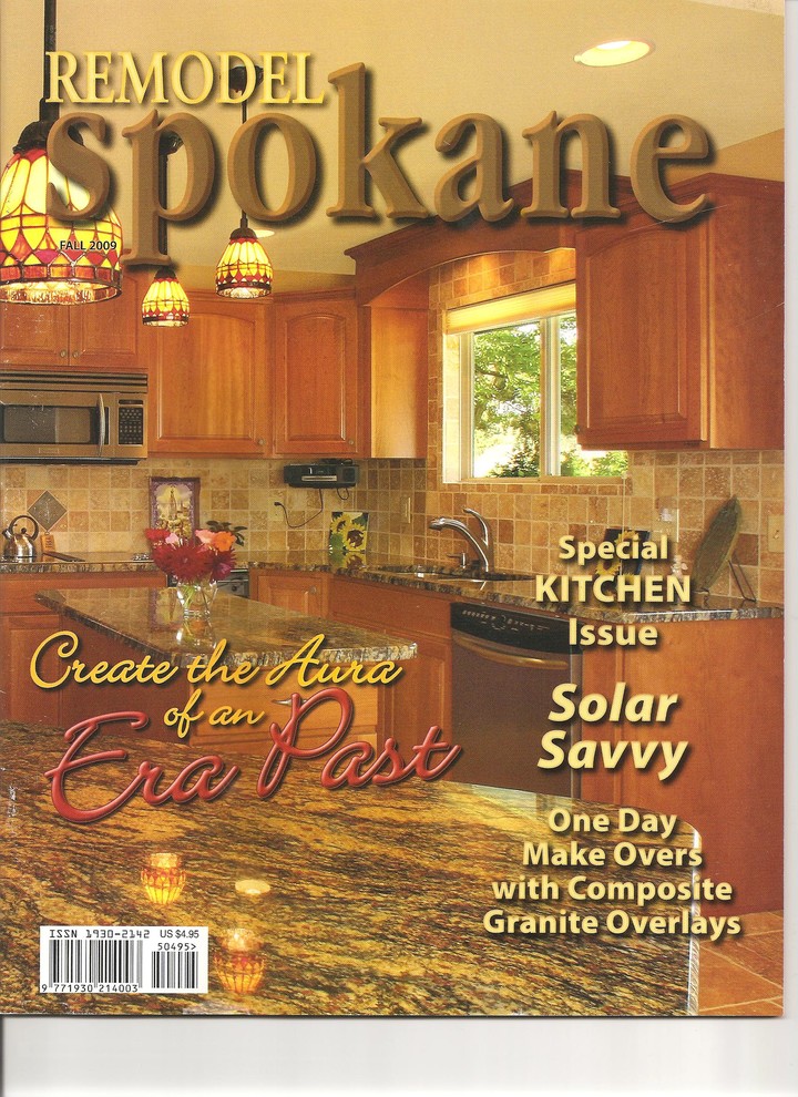 Inspiration for a rustic marble floor kitchen remodel in Seattle with an undermount sink, raised-panel cabinets, dark wood cabinets, granite countertops, multicolored backsplash, stone tile backsplash and white appliances