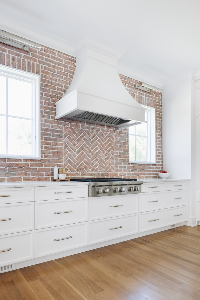 South Coast Farmhouse - A unique, white-washed brick kitchen backsplash