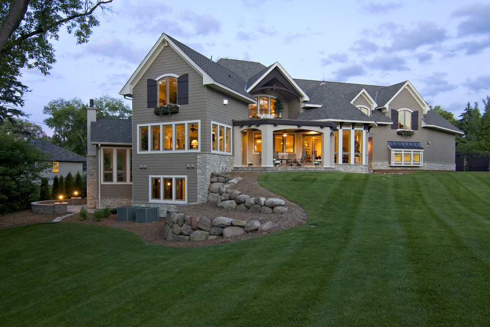 Photo of a traditional exterior in Minneapolis with wood siding.