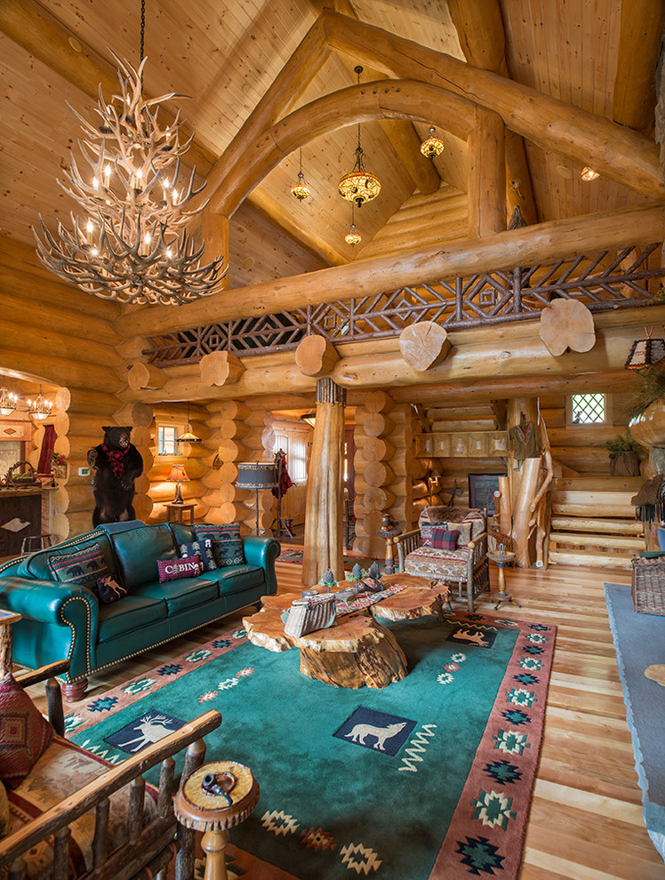 Inspiration for a rustic open concept medium tone wood floor home design remodel in New York with brown walls