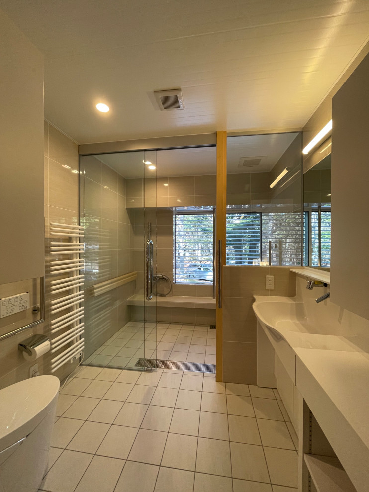 Design ideas for a medium sized modern bathroom in Other with open cabinets, white cabinets, a one-piece toilet, beige tiles, ceramic tiles, beige walls, porcelain flooring, an integrated sink, solid surface worktops, white floors, white worktops, feature lighting and a built in vanity unit.