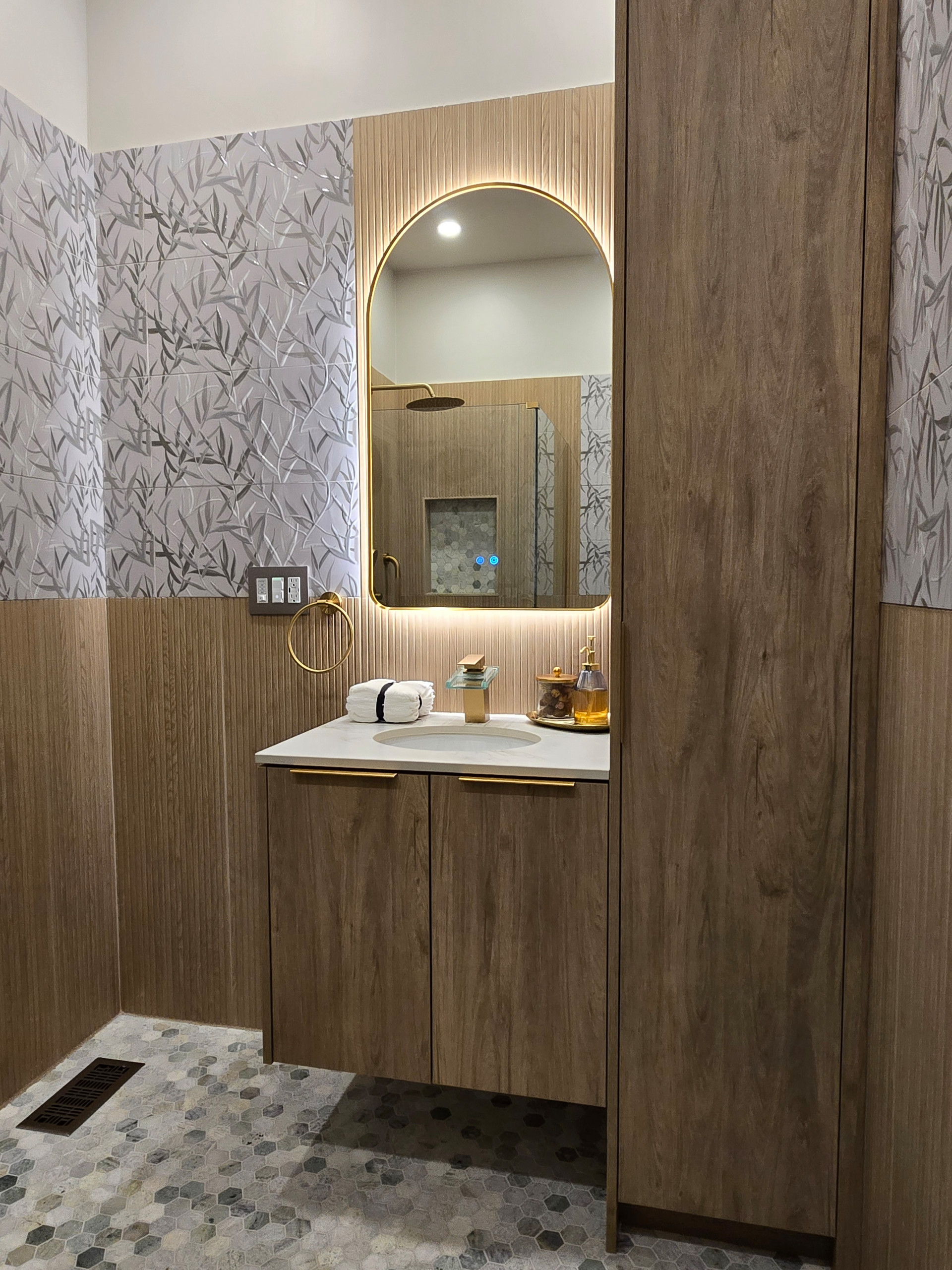 Powder room transformed to Full 1st Floor Bathroom with walk-in shower