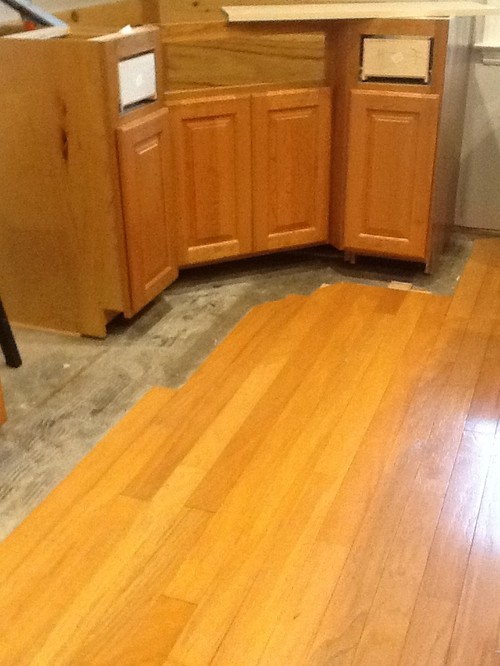 What color floors with natural cherry cabinets?