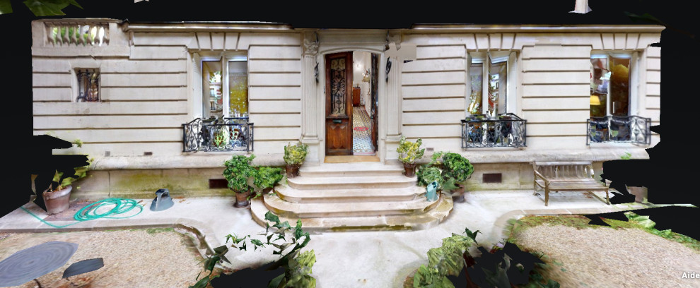 パリにあるコンテンポラリースタイルのおしゃれな家の外観 (アパート・マンション、ウッドシングル張り、石材サイディング) の写真